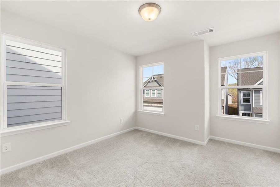 Spacious, unfurnished interior of a new home in The Village at Shallowford, Kennesaw (Image 24).