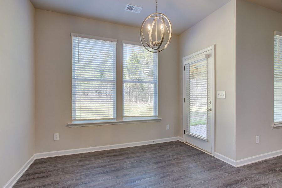 Breakfast area off kitchen with access to patio