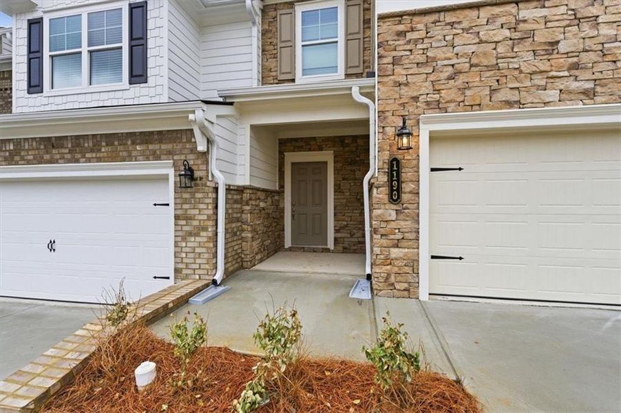 Exterior details and patio area of a home in Park Center Pointe, Mableton (Image 18).