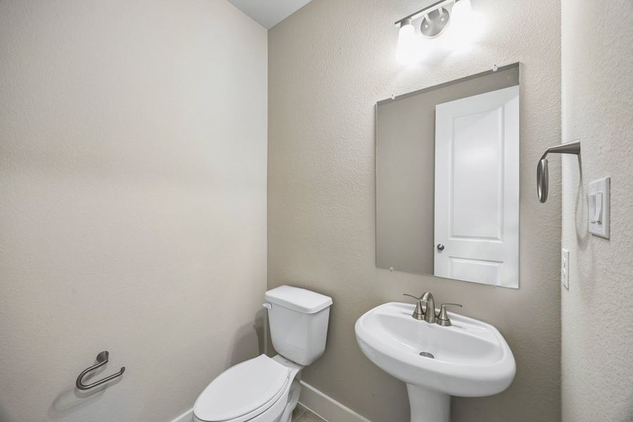 Representative furnished interior of a home built from the The Mockingbird by Lillian Custom Homes in Polo Ridge, Forney (Image 9).