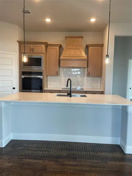 Furnished interior view inside a new home in Mercer Meadows, Royse City (Image 9).