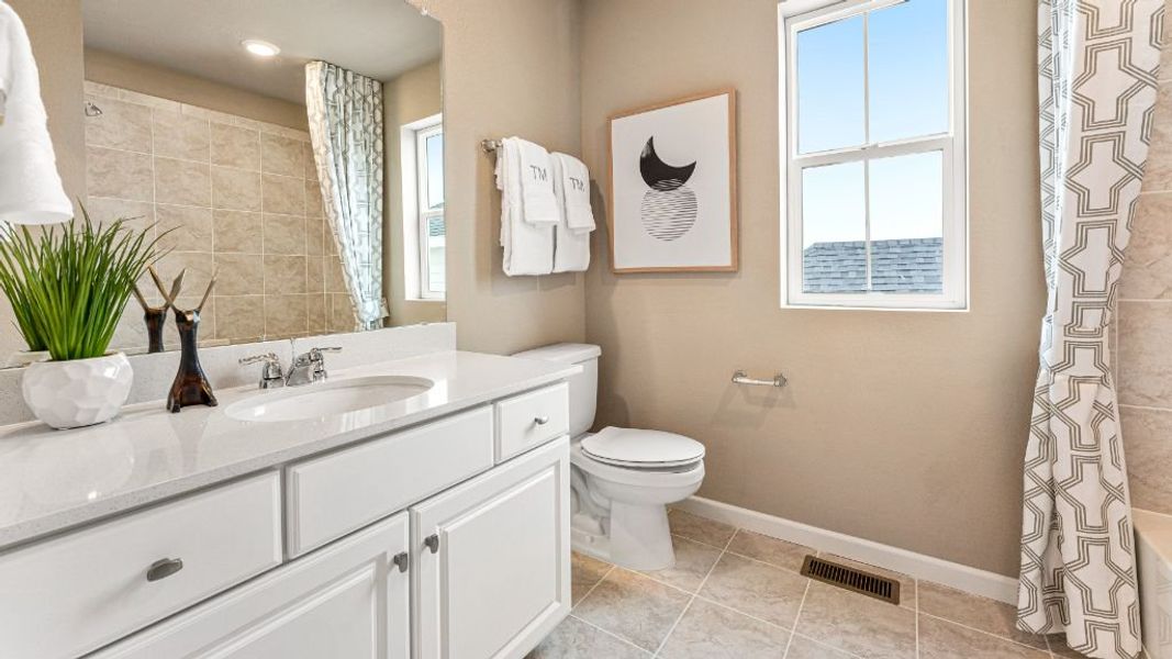 Furnished interior view inside a new home in The Aurora Highlands, Aurora (Image 23).