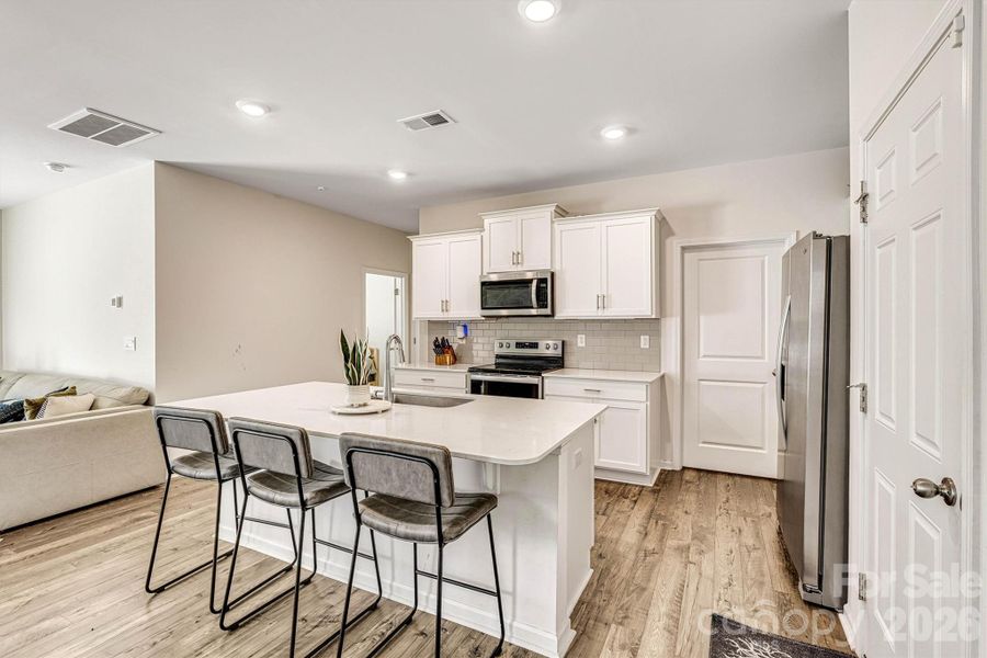 Furnished interior view inside a new home in , Hickory (Image 16).