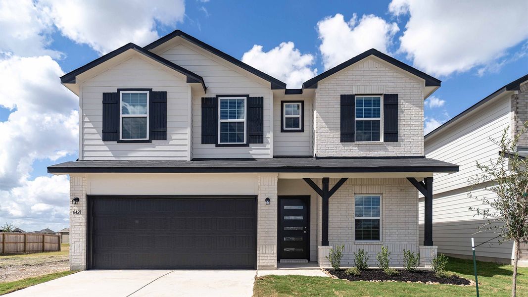 Front exterior of a new home in Morgan Meadows, San Antonio, TX, highlighting curb appeal (Image 1). Front exterior of a new home in Morgan Meadows, San Antonio, TX, highlighting curb appeal (Image 1).