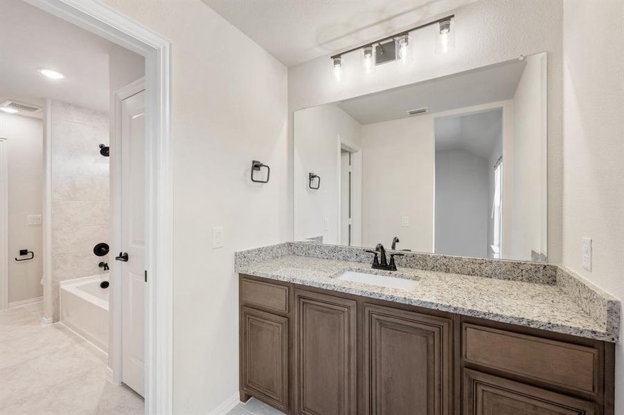 Furnished interior view inside a new home in Mockingbird Hills 60-65, Joshua (Image 6).