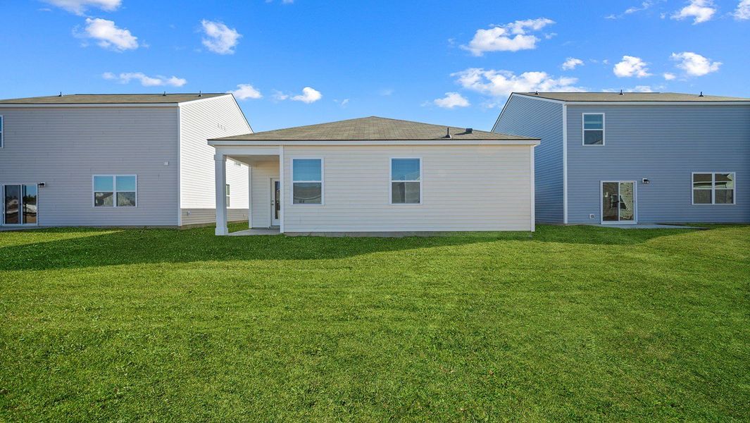 Exterior details and patio area of a home in The Retreat at East Argent, Ridgeland (Image 2).