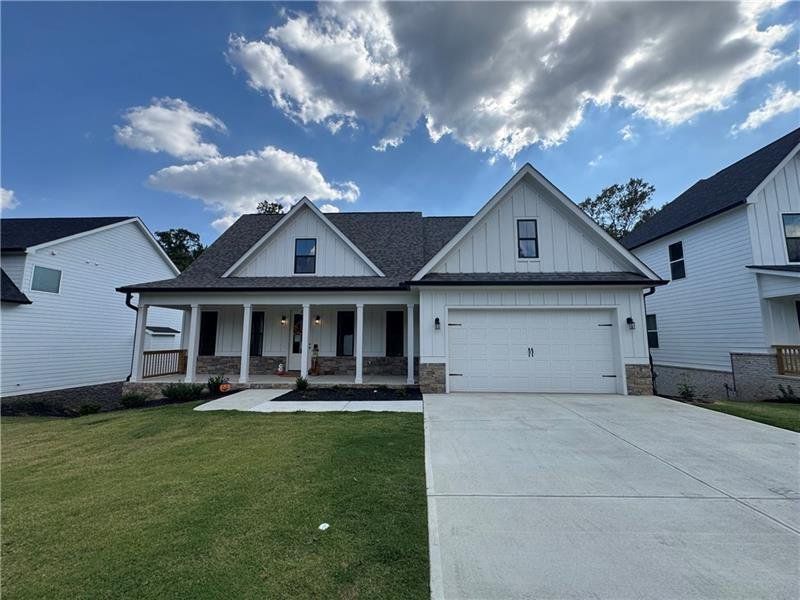 Front exterior of a new home in , Cartersville, GA, highlighting curb appeal (Image 17).