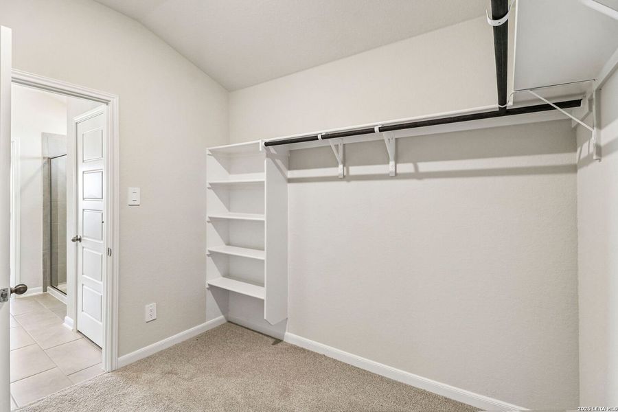Spacious, unfurnished interior of a new home in Estancia Ranch - Premier Series, San Antonio (Image 38). Spacious, unfurnished interior of a new home in Estancia Ranch - Premier Series, San Antonio (Image 38).