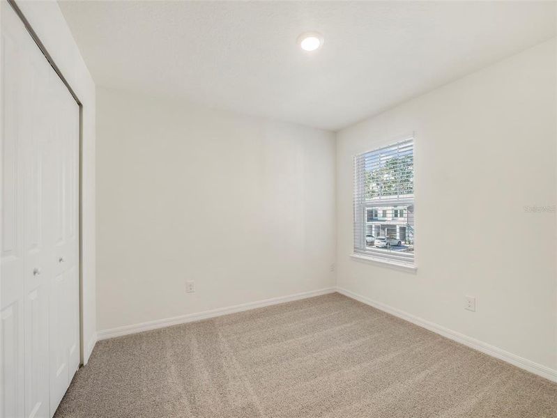 Spacious, unfurnished interior of a new home in Towns at Riverwalk, Sanford (Image 18).