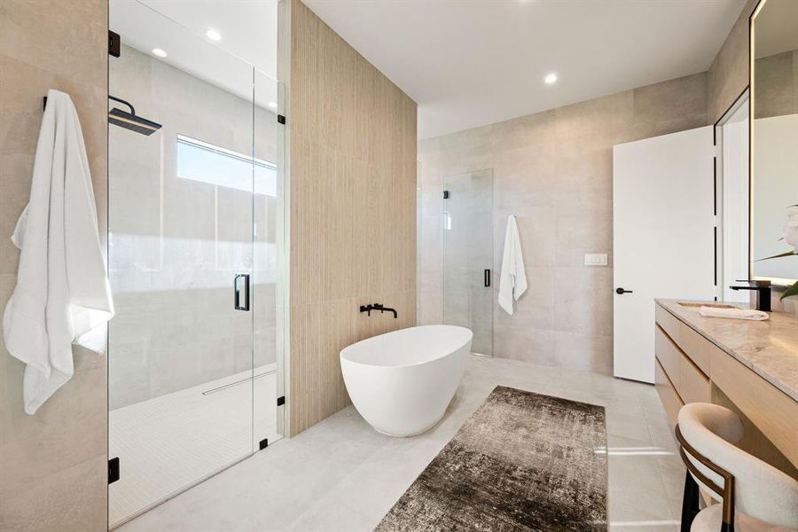 Enjoy a large soaking tub in the primary suite. Enjoy a large soaking tub in the primary suite.