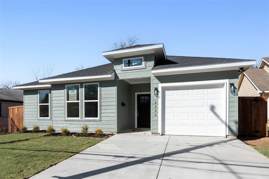 Front exterior of a new home in , Dallas, TX, highlighting curb appeal (Image 17).