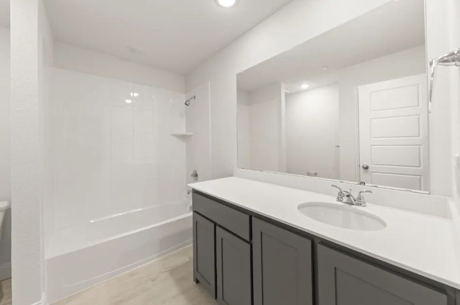 Front exterior of a new home in Sereno Oaks at Buckner Terrace, Dallas, TX, highlighting curb appeal (Image 17).