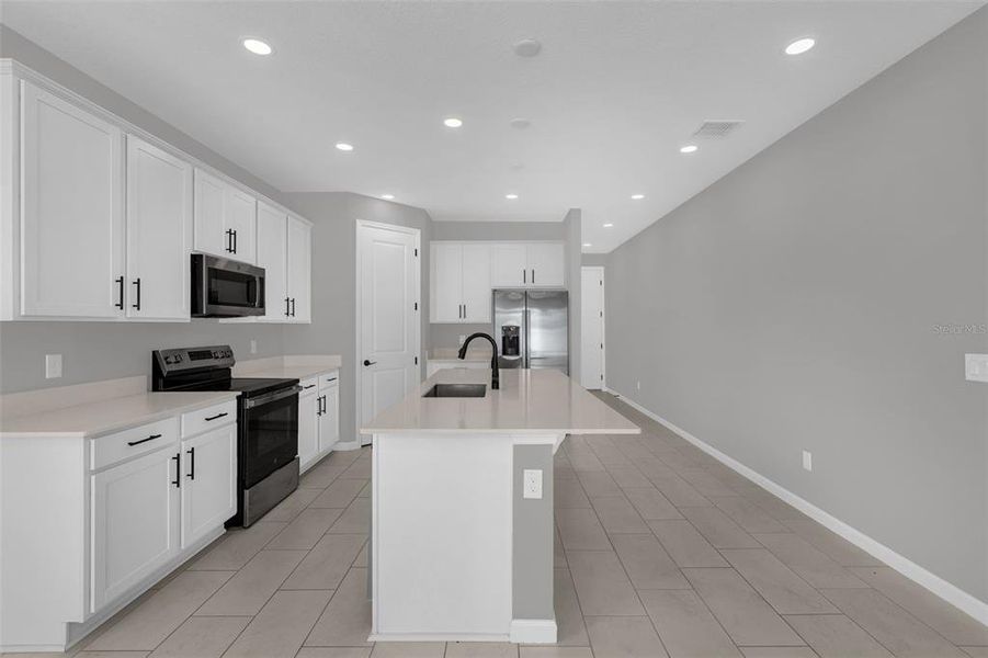 Furnished interior view inside a new home in Seasons at Lakeside Forest, Tavares (Image 31).