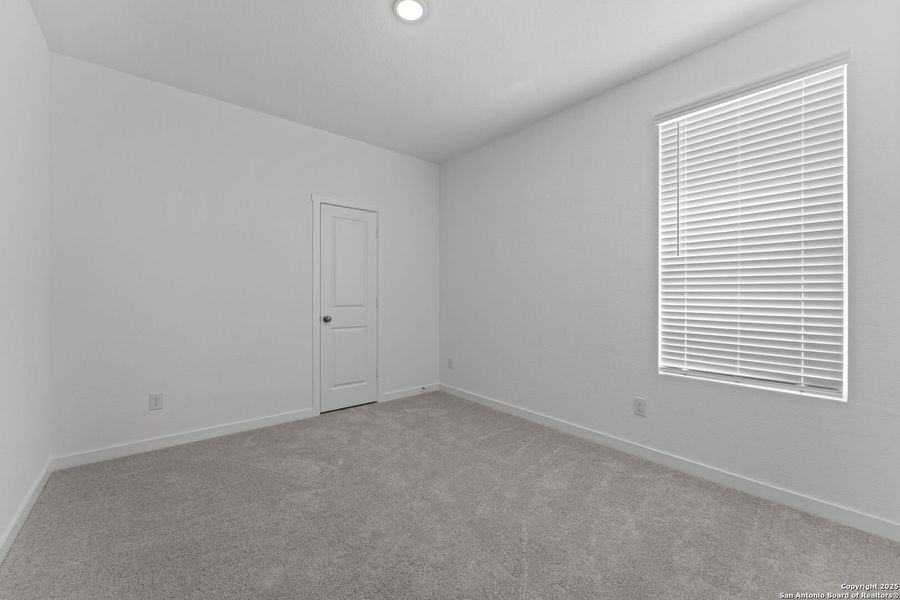 Spacious, unfurnished interior of a new home in Waterwheel: Coastline Collection, San Antonio (Image 15).