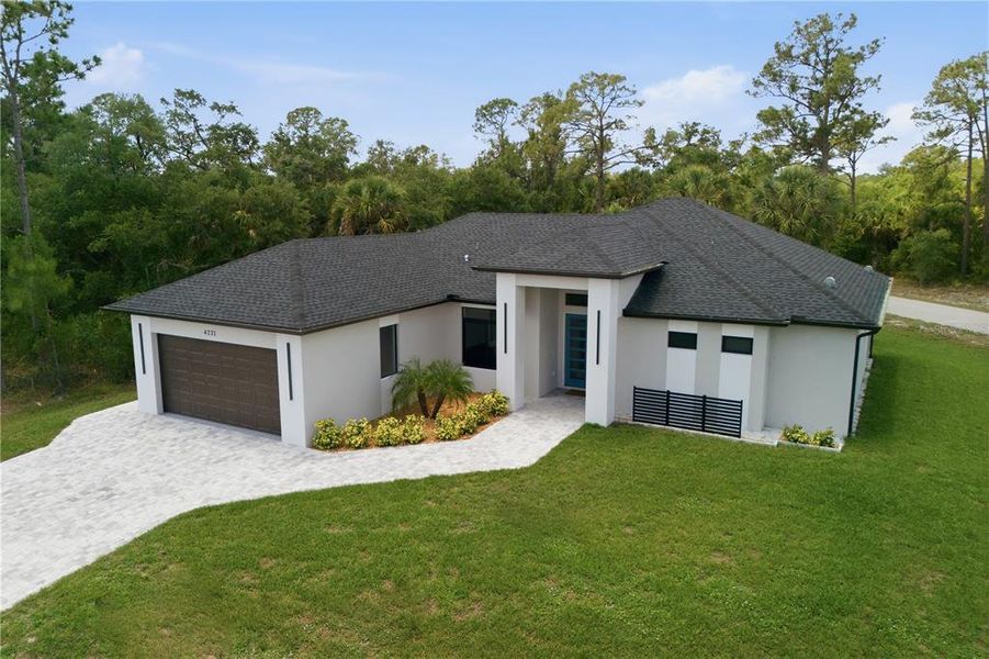 Front exterior of a new home in , North Port, FL, highlighting curb appeal (Image 27).