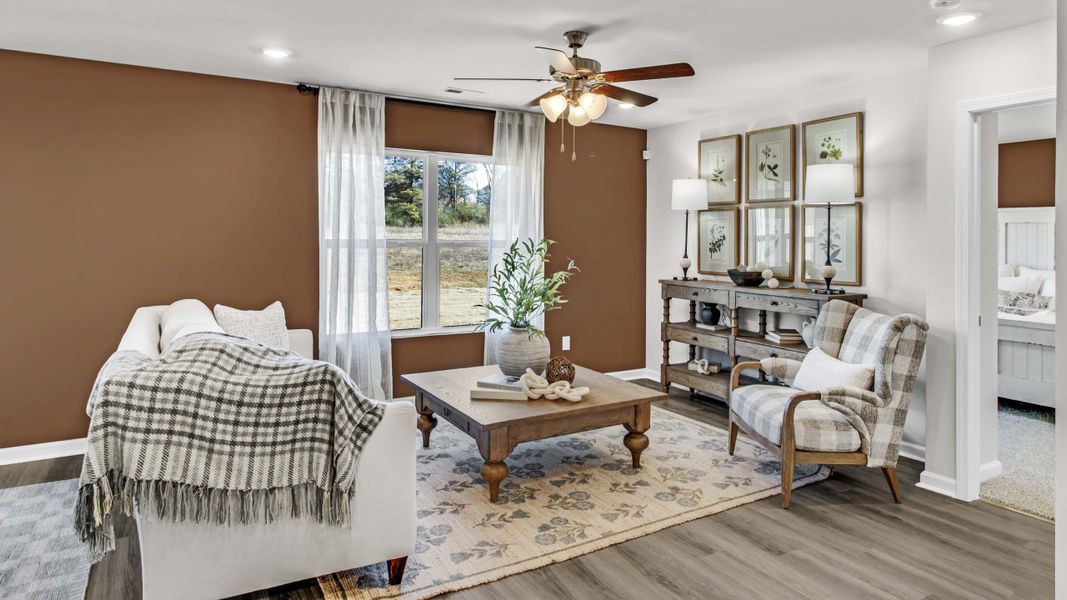 Representative furnished interior of a home built from the Freeport by D.R. Horton in Bailey Park, Fayetteville (Image 24).