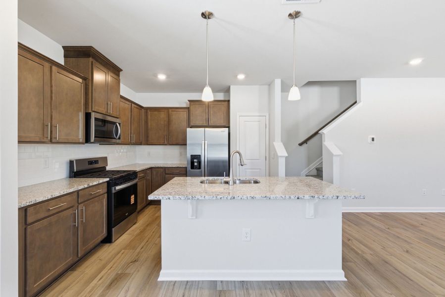Furnished interior view inside a new home in Poets Walk, Whitsett (Image 13).
