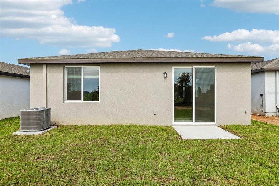 Exterior details and patio area of a home in Benton Hills - Premier Series, Brooksville (Image 23).