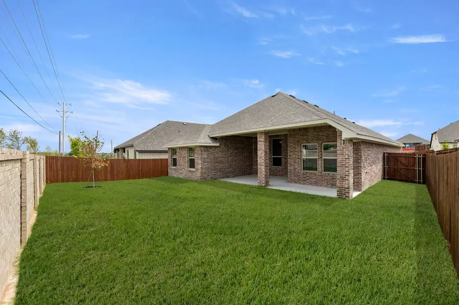 Front exterior of a new home in Arcadia Trails, Balch Springs, TX, highlighting curb appeal (Image 27).