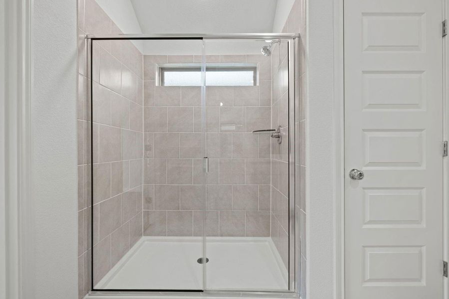 Primary Bathroom in the Quartz home plan by Trophy Signature Homes – REPRESENTATIVE PHOTO Primary Bathroom in the Quartz home plan by Trophy Signature Homes – REPRESENTATIVE PHOTO