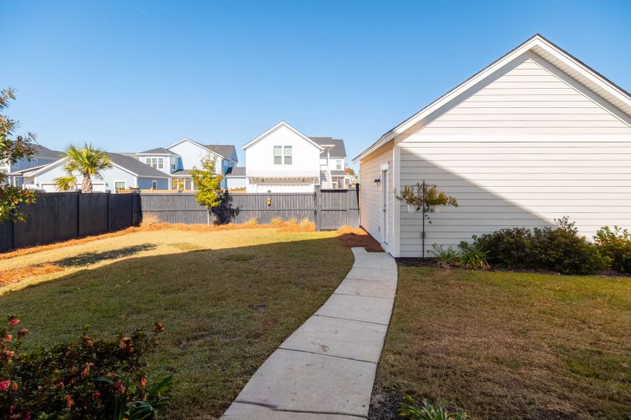 Front exterior of a new home in Midtown at Nexton, Summerville, SC, highlighting curb appeal (Image 22). Front exterior of a new home in Midtown at Nexton, Summerville, SC, highlighting curb appeal (Image 22).