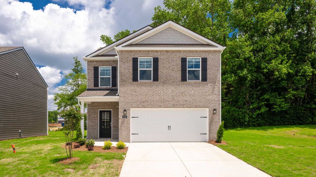Front exterior of a new home in Fairview Hills, Cleveland, TN, highlighting curb appeal (Image 1). Front exterior of a new home in Fairview Hills, Cleveland, TN, highlighting curb appeal (Image 1).