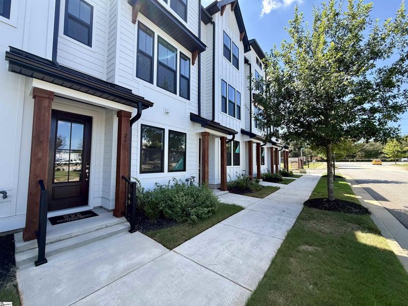 Exterior details and patio area of a home in Renaissance Place, Greenville (Image 18).