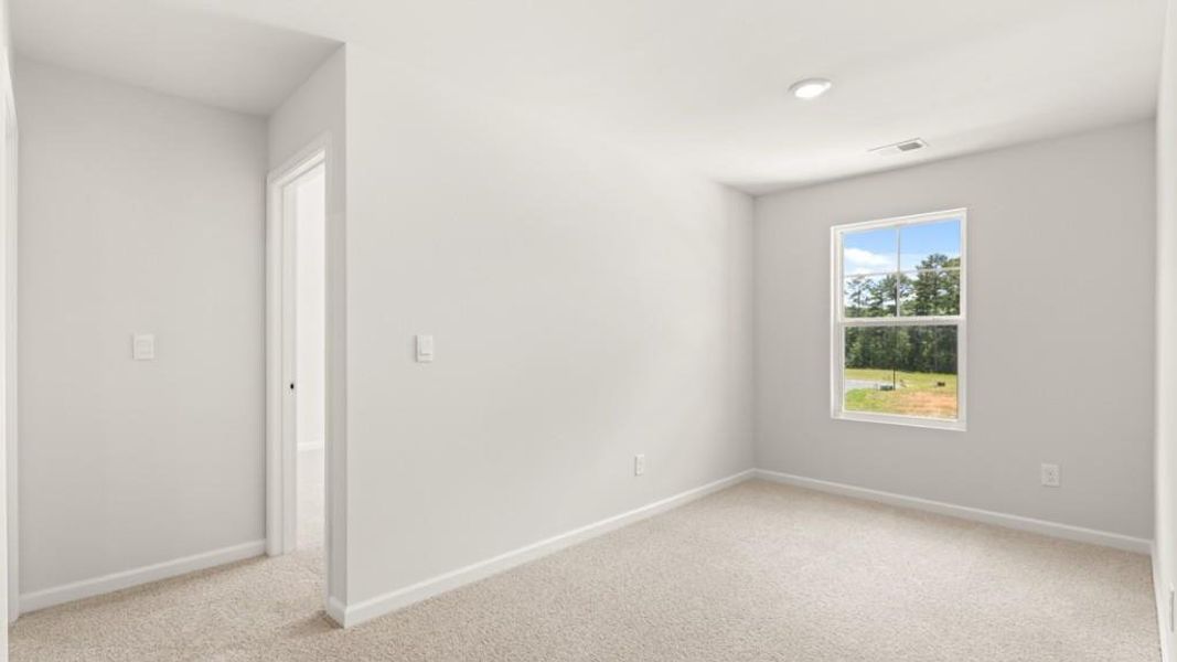 Spacious, unfurnished interior of a new home in Fairway 17 at Mirror Lake, Villa Rica (Image 19).