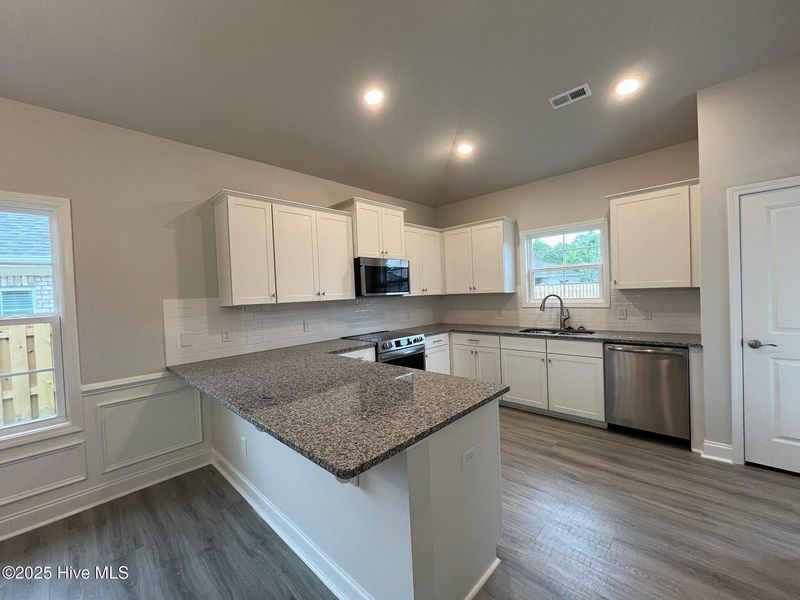 Furnished interior view inside a new home in Palmetto Creek, Bolivia (Image 5).