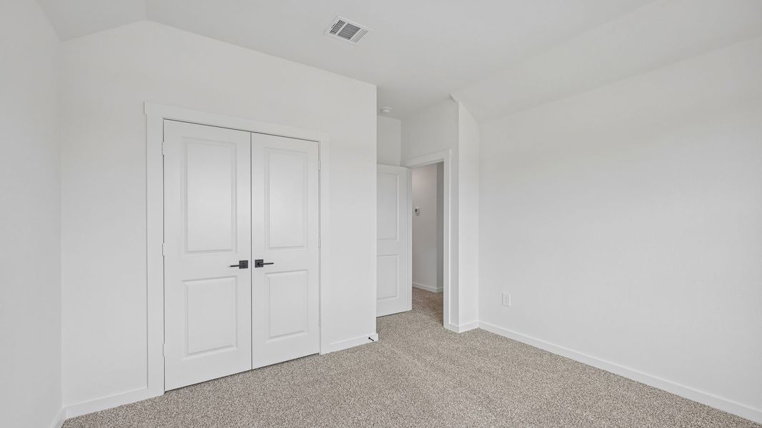 Spacious, unfurnished interior of a new home in The Enclave at Bar W Ranch, Leander (Image 31).
