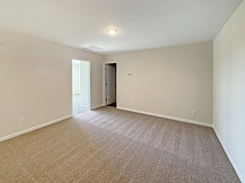 Spacious, unfurnished interior of a new home in The Village at Sassafras, Allenhurst (Image 13).