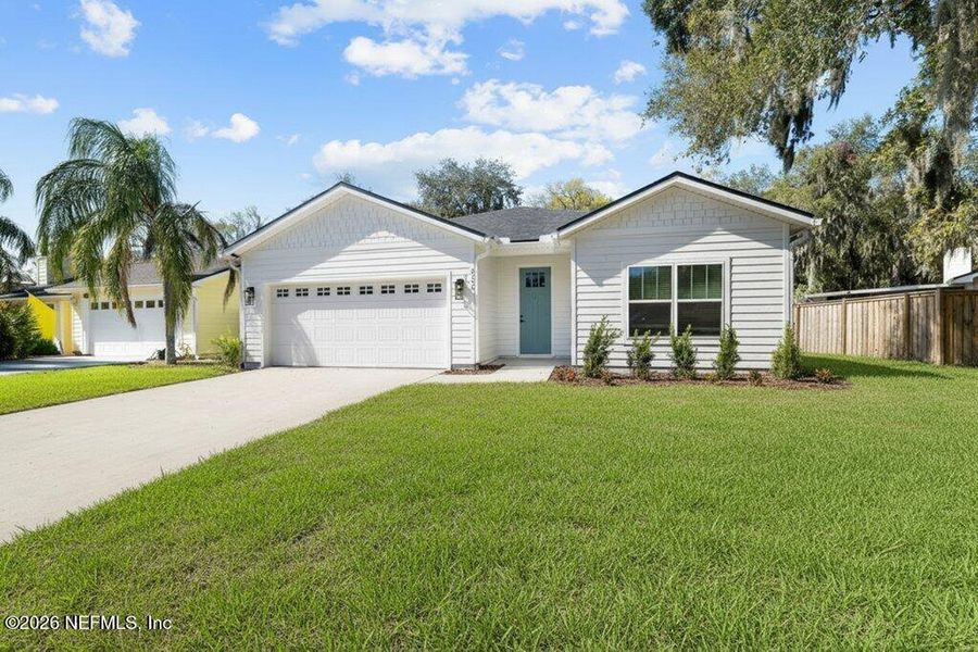 Front exterior of a new home in , Jacksonville, FL, highlighting curb appeal (Image 25).