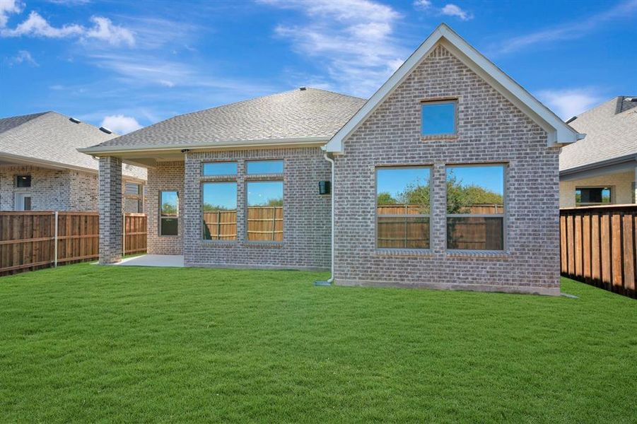 Exterior details and patio area of a home in South Pointe  Cottage Series, Mansfield (Image 21).