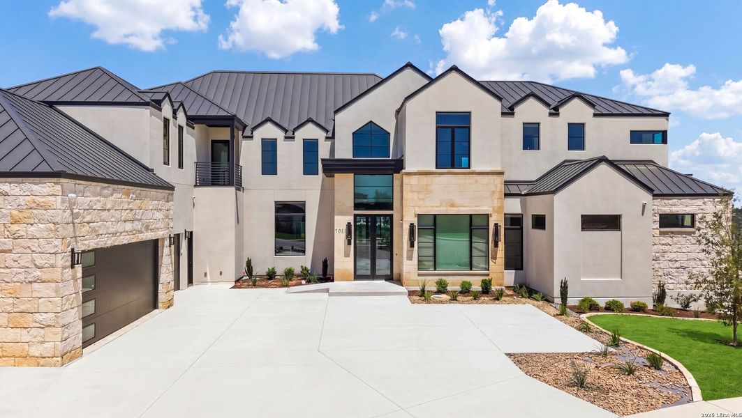 Front exterior of a new home in , San Antonio, TX, highlighting curb appeal (Image 1). Front exterior of a new home in , San Antonio, TX, highlighting curb appeal (Image 1).