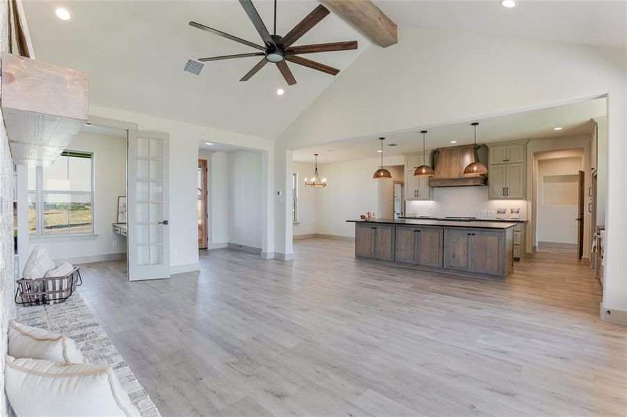 Spaces flow naturally from the living, kitchen and dining areas. The warm neutral palette is inviting and cozy. Spaces flow naturally from the living, kitchen and dining areas. The warm neutral palette is inviting and cozy.