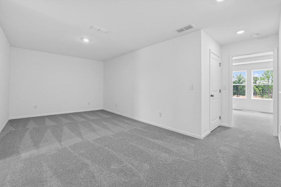 Spacious, unfurnished interior of a new home in Weatherfield, Buford (Image 25).