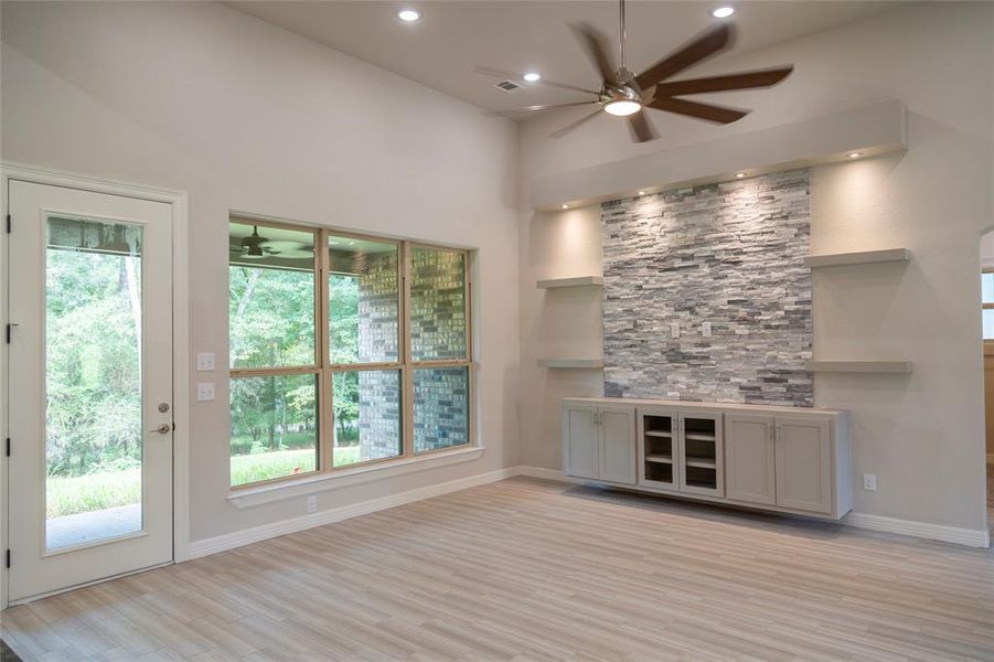 Main living area has canned lighting, ceiling fan, large 5' low E windows and 8' door with 10' ceilings.