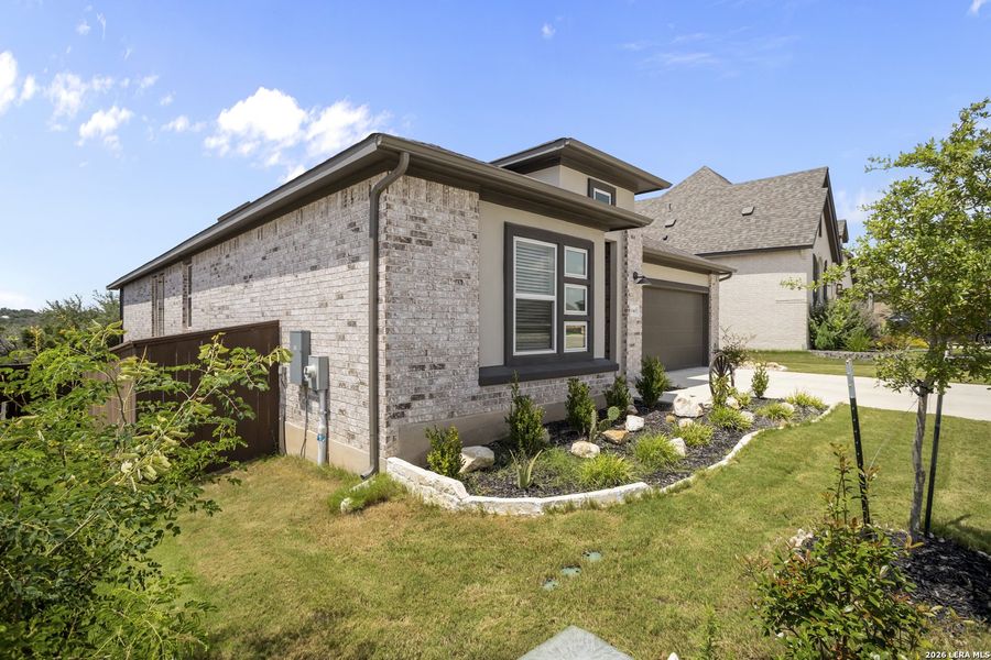 Front exterior of a new home in , San Marcos, TX, highlighting curb appeal (Image 22).
