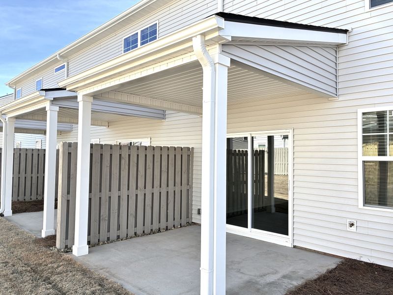 Exterior details and patio area of a home in Holly Ridge, Greenville (Image 3).