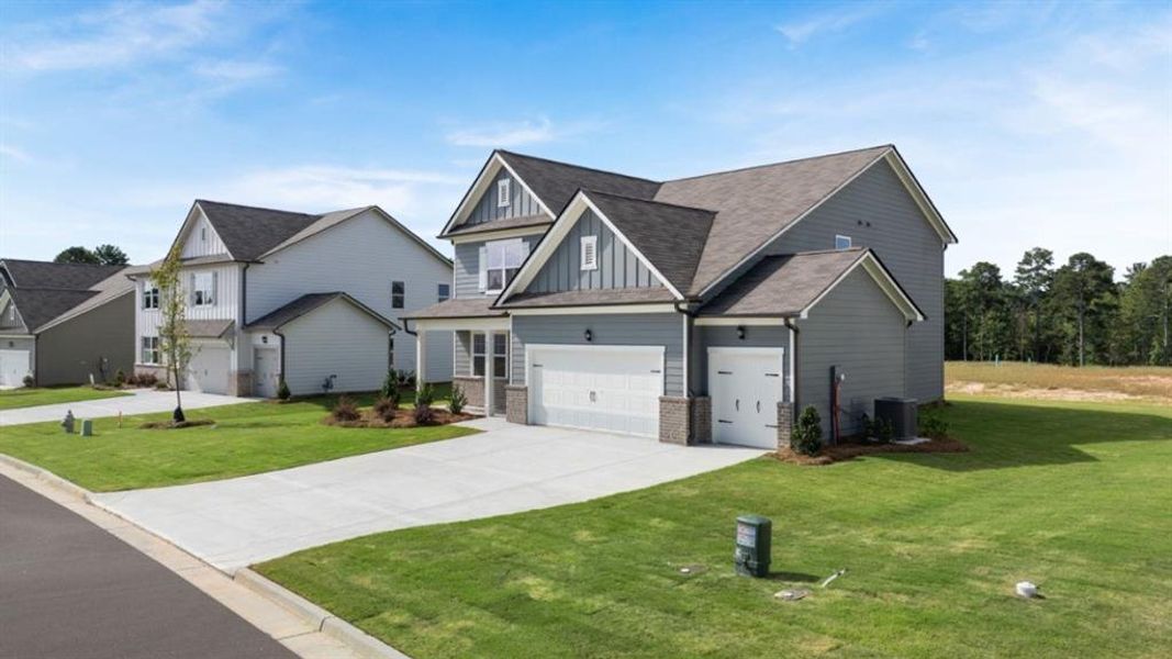 Front exterior of a new home in , Villa Rica, GA, highlighting curb appeal (Image 22). Front exterior of a new home in , Villa Rica, GA, highlighting curb appeal (Image 22).