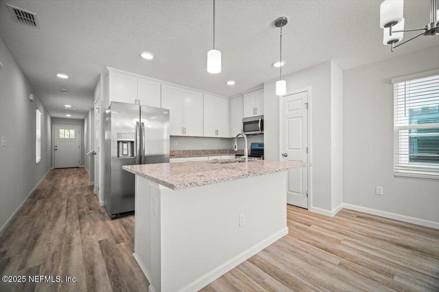 Furnished interior view inside a new home in , Jacksonville (Image 5). Furnished interior view inside a new home in , Jacksonville (Image 5).