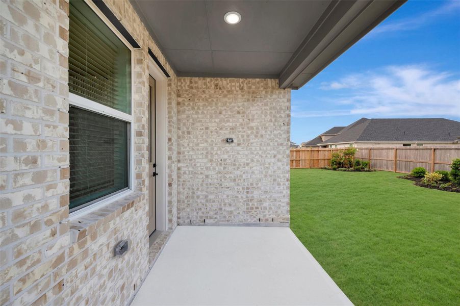 Relax outdoors on the covered patio