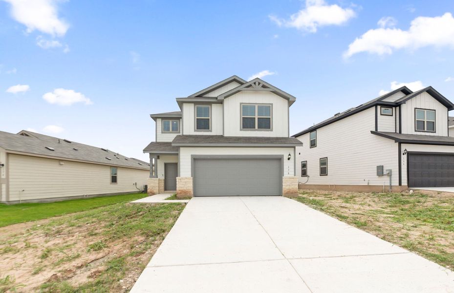 Front exterior of a new home in Sonterra, Jarrell, TX, highlighting curb appeal (Image 1). Front exterior of a new home in Sonterra, Jarrell, TX, highlighting curb appeal (Image 1).