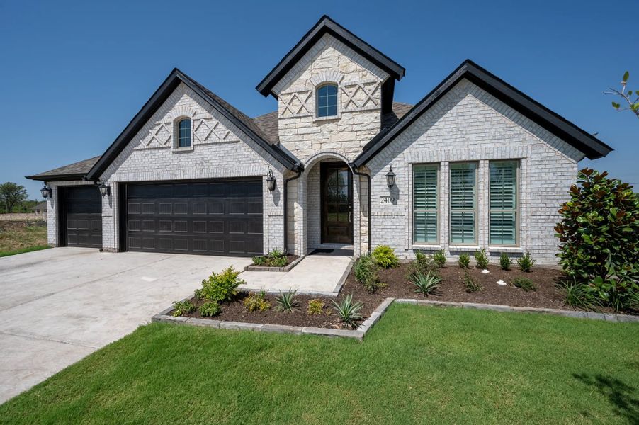 Front exterior of a home in the Meadow Vista community, located in Anna, TX (Image 1).
