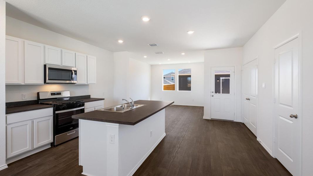 Furnished interior view inside a new home in Valverde, Bastrop (Image 6).
