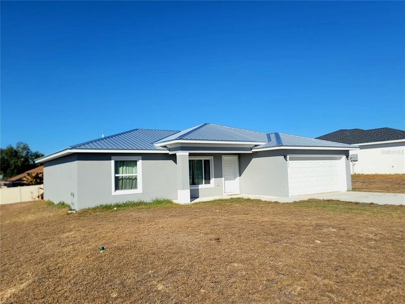 Exterior details and patio area of a home in , Ocala (Image 4).