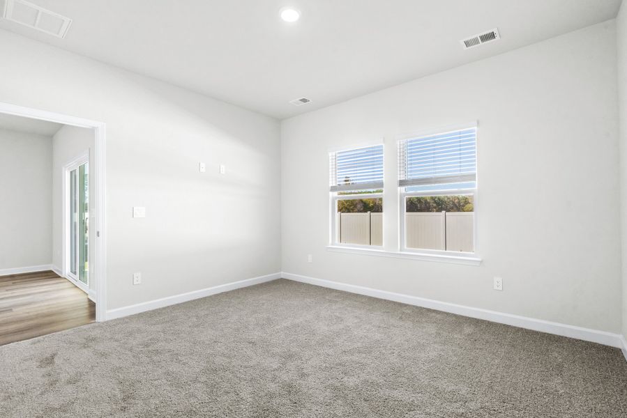 Spacious, unfurnished interior of a new home in Cypress Ridge - The Boardwalk Series, Longs (Image 21).