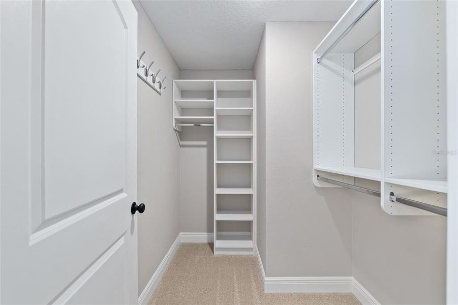 closet #1 customized. Two nice closets in Primary bedroom.