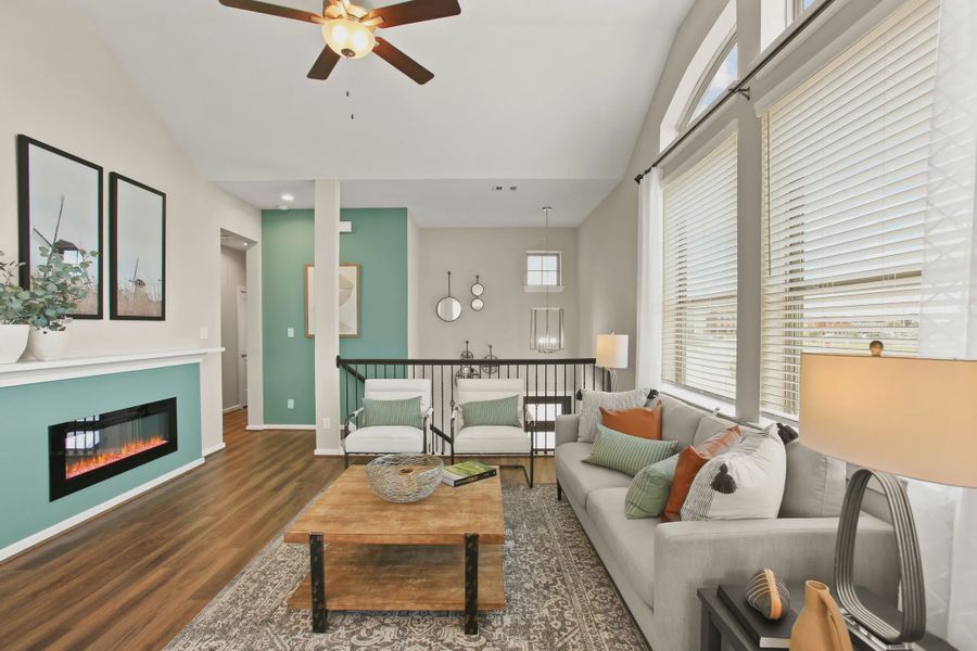 Representative furnished interior of a home built from the Summerhouse 2 by Chesmar Homes in Meridiana Townhomes, Iowa Colony (Image 6).