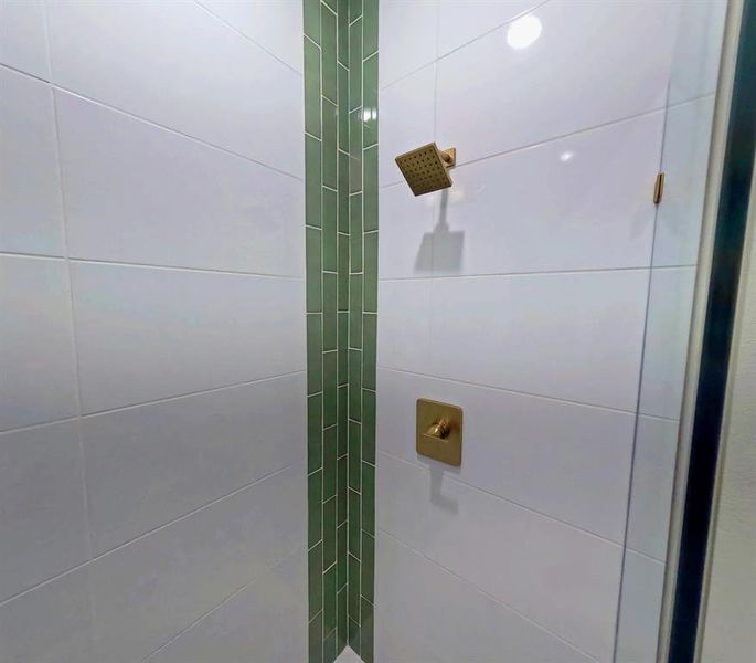 Bathroom view of a tile shower Bathroom view of a tile shower